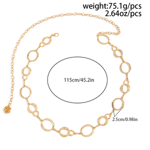 Detailed view of punk metal waist chain with textured rings and rose pendant detail
