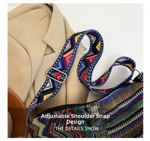 Detail of multi-color woven geometric strap and silver metal buckle on a bohemian tote