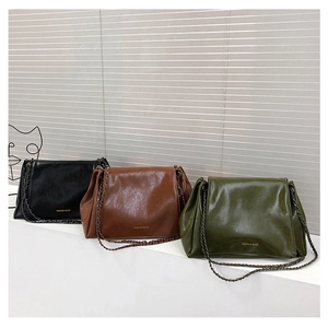 Detailed comparison of vintage leather crossbody bags in black, brown, and olive green colors