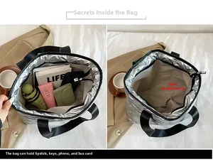 Detailed view of spacious silver tote bag interior showing capacity for daily essentials