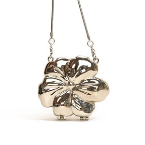 Elegant gold flower shaped metal evening clutch bag with delicate snake chain strap