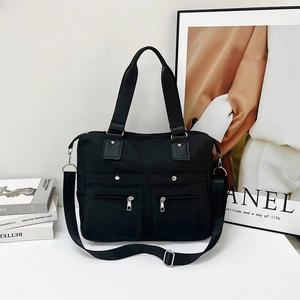 Waterproof black nylon oxford crossbody bag with multiple pockets and wide handles