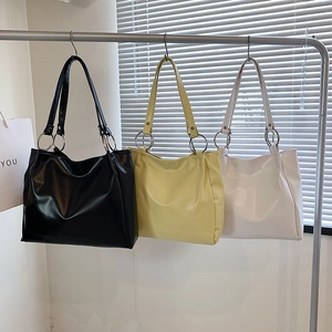 Minimalist large PU leather tote bag set in black, yellow, and white with metal rings