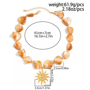 Detailed view of the sun pendant necklace with amber resin beads and size dimensions