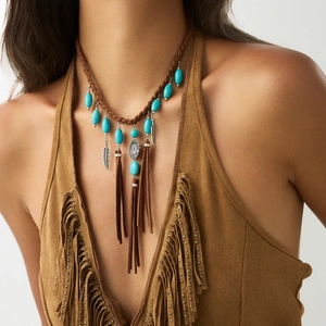 Bohemian turquoise necklace with silver feather charms and long brown tassel fringe