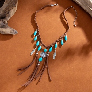 Bohemian fringe necklace with turquoise beads and feather pendants on brown braided rope
