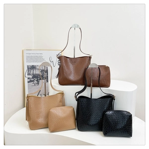 Minimalist woven tote bag set in brown, beige and black with matching small pouches