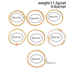 Détails du lot de 7 bracelets à perles avec pendentifs en forme de croix et d'étoile