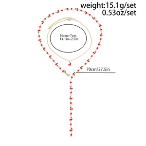 Collana doppia con ciliegia dorata che mostra dimensioni e peso di 15,1g in dettaglio