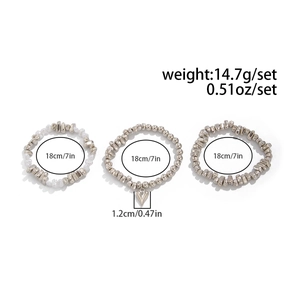 Detailed view of beaded bracelet set with heart pendant and metallic beads measurements