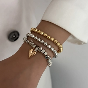 Three-piece beaded bracelet set with heart pendant and metallic CCB beads in gold and silver
