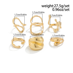 Detailed view of 6-piece irregular gold liquid metal ring set with size specifications
