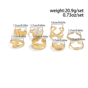 Detail view of 8pcs gold waterdrop geometric rings with sizes and weight 20.9g