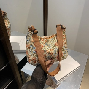 Floral canvas shoulder bag with wide nylon strap and vintage floral pattern for women