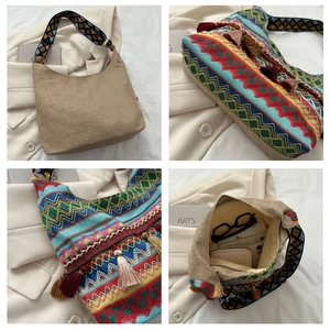 Dettaglio del ricamo bohémien e nappe colorate su una borsa tote in lino