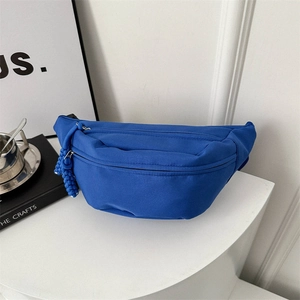 Sac de poitrine bleu vif minimaliste avec double fermeture éclair et nœud tissé