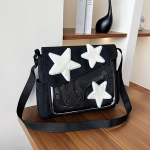 Borsa a tracolla in tela nera con stelle di peluche bianche e tasca in PVC trasparente