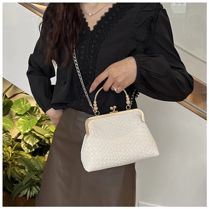 Elegant white woven leather shell bag with gold handle and metal chain strap for women