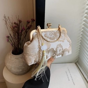 Elegant Chinese silk embroidery evening clutch bag with gold floral patterns and long tassel