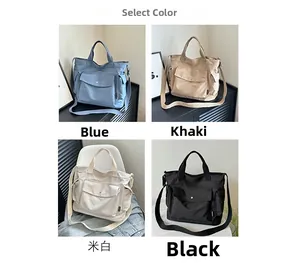 Selection of large canvas tote bags in blue, khaki, off-white, and black colors