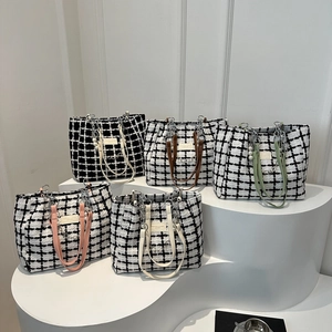 Fashionable plaid tweed tote bag with pearl chain pendants and leather handles