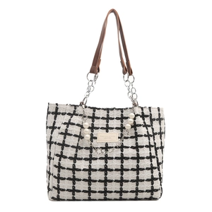 Classic black and white checkered tweed tote bag with pearl chain and leather handles