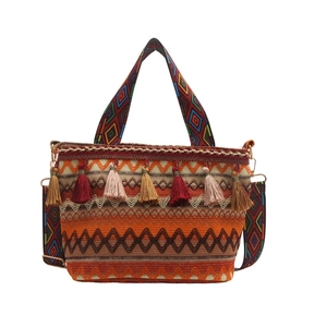 Borsa tote intrecciata bohémien con motivi arancioni e nappe multicolore