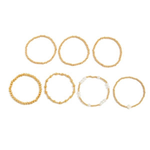 Ensemble de 7 bracelets en perles dorées avec pendentif croix et perles nacrées