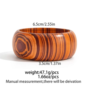 Dettaglio dimensioni di questo bracciale vintage in legno con 6,5 cm di diametro e 3,5 cm di larghezza