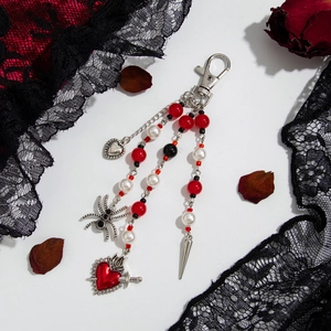 Gothic beaded waist charm featuring silver dragon lobster clasp and red heart sword pendant