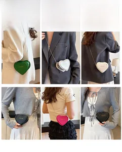 Detailed view of heart-shaped mini crossbody bags in various colors with metal chains