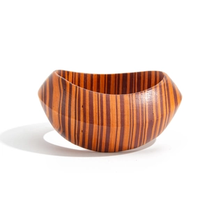Ethnic style wide wooden bangle with irregular vertical stripes in orange and dark brown