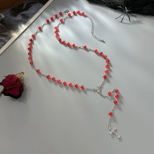 Gothic red glass bead necklace with silver cross pendant and religious saint medallion