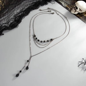 Collier ras de cou gothique multicouche avec pendentif en cristal noir et franges