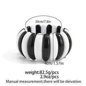 Detail showing dimensions of black and white resin geometric bracelet with measurements