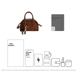 Borsa Boston vintage marrone che mostra la capacità per iPad, telefono e oggetti