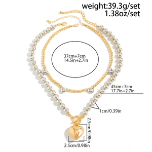 Size chart for layered beaded necklace with heart pendant and OT toggle clasp details