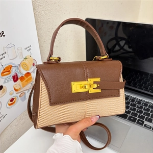 Borsa Kelly alla moda in pelle marrone e paglia bicolore con chiusura a scatto dorata