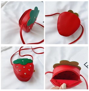 Macro views of red strawberry mini crossbody bag showing rhinestone details and interior