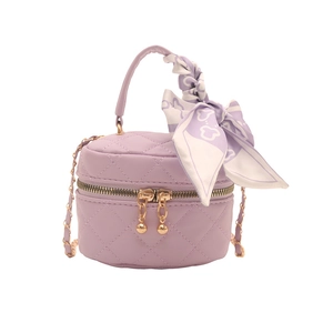 Lavender quilted cylinder bag with chic scarf handle and gold chain shoulder strap