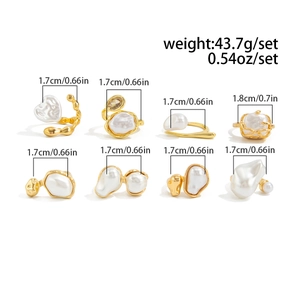 Detailed set of 8 gold-plated irregular rings with faux pearls and crystals