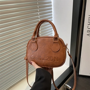 Sac à main rond minimaliste marron vintage avec gaufrage COIH'2DN et fine bandoulière