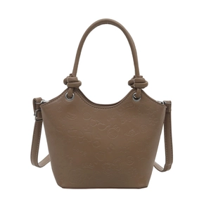 Vintage brown embossed bucket bag for women with floral patterns and top handle