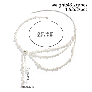 Dettaglio catena corpo con perle che mostra lunghezza 70cm e catena di estensione