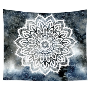Detail of mandala tapestry showing intricate geometric patterns on starry blue background
