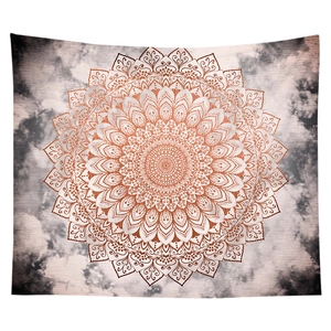 Detailed view of bronze mandala tapestry with complex radial patterns on cloud texture