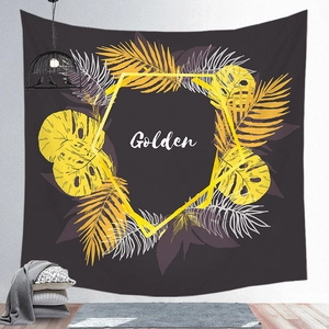 Detailed view of Nordic tropical palm leaf tapestry featuring golden art print on wall