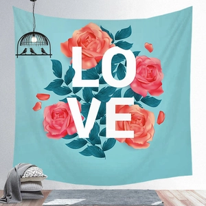 Detailed view of a romantic floral wall tapestry featuring pink roses and LOVE lettering
