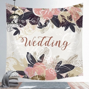 Detailed view of elegant wedding wall tapestry with floral patterns and cursive text