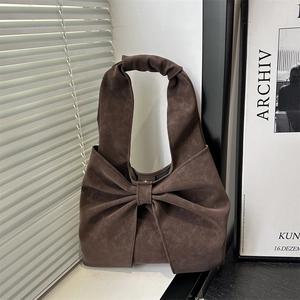 Sac à bandoulière marron rétro en similicuir suédé avec détail nœud géant élégant